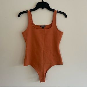 Shinestar Orange Bodysuit